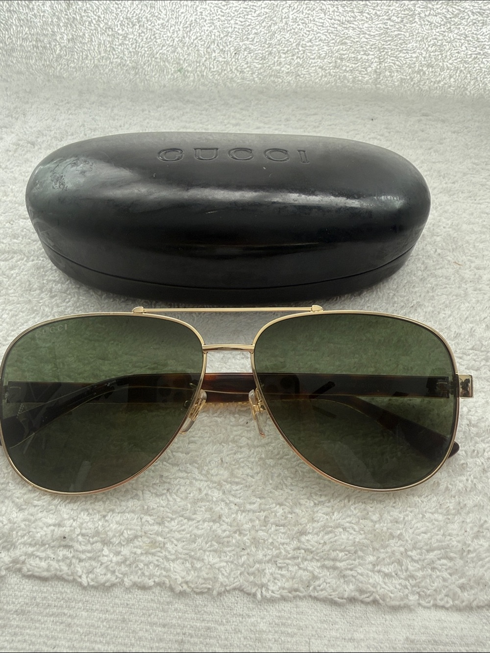 Gucci GG0528S Gold Aviator Sunglasses with Green Lenses